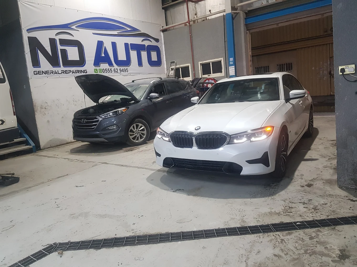 BMW at ND Auto General Repair body shop ready for paint repair
