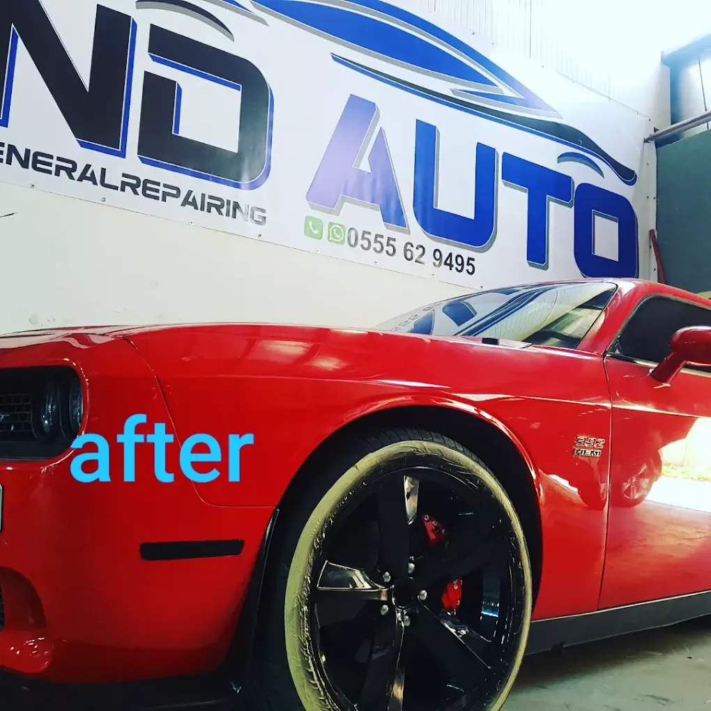 Red Dodge Challenger after full body paint at ND Auto General Repair Dubai